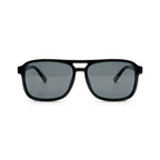 Occhiali da sole zo-oz stile aviator modello Hop nero lucido per bambini 6-12 anni. Inquadratura frontale con le aste aperte appoggiate su una superficie.